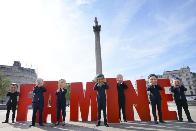 Oxfam's satirical “big heads” of the G7 leaders pose in Trafalgar Square, London, Wednesday, May 17, 2023, ahead of the start of the G7 summit in Japan. Britain's Prime Minister Rishi Sunak and the other G7 leaders 'big heads' made an appearance in London's Trafalgar Square to highlight their lack of action to tackle the East Africa hunger crisis, despite G7 leaders' promise to end famine when they met in the UK two years ago. (Photo by Kirsty Wigglesworth/AP Photo)