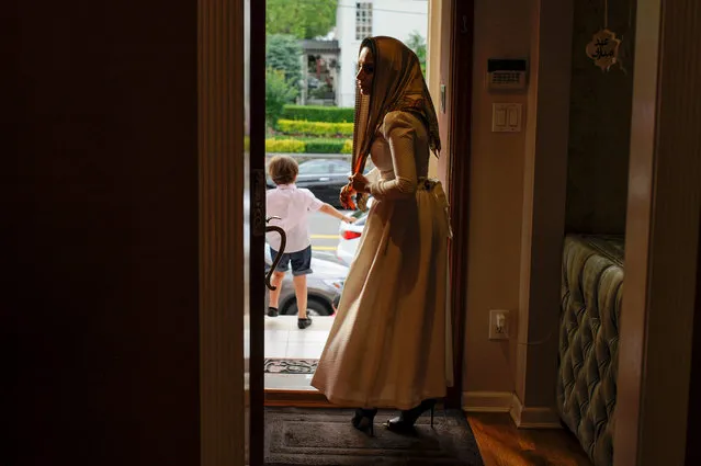 Yemeni-American Muslim Yusra Udayni prepares to leave her home to take part in Eid al-Fitr Islamic prayers in Brooklyn, New York, U.S., June 25, 2017. (Photo by Kholood Eid/Reuters)