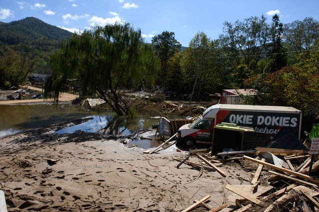 Destruction is seen across from the Swannanoa River on October 2, 2024 in Swannanoa, North Carolina. According to reports, at least 160 people have been killed across the southeastern U.S., and more than a million are without power due to the storm. The White House has approved disaster declarations in multiple southern states, freeing up federal emergency management money and resources. (Photo by Melissa Sue Gerrits/Getty Images)