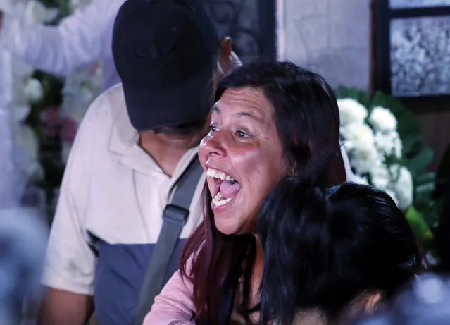 Maria Magdalena Anton, mother of Fatima, a 7-year-old girl who was abducted from the entrance of the Enrique C. Rebsamen primary school and later killed, screams “Justice” during the girl's wake at thier home in Mexico City, Monday, February 17, 2020. Fatima's body was found wrapped in a bag and abandoned in a rural area on Saturday and was identified by genetic testing. (Photo by Marco Ugarte/AP Photo)