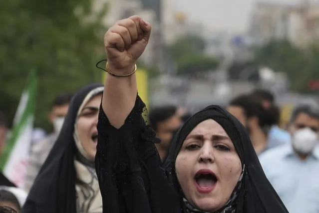 A demonstrator chants slogans while attending the annual pro-Palestinian Al-Quds, or Jerusalem, Day rally in Tehran, Iran, Friday, April 29, 2022. (Photo by Vahid Salemi/AP Photo)