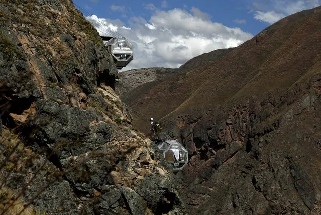 Sleeping pods at the Skylodge Adventure Suites are pictured in the Sacred Valley in Cuzco, Peru, August 14, 2015. (Photo by Pilar Olivares/Reuters)