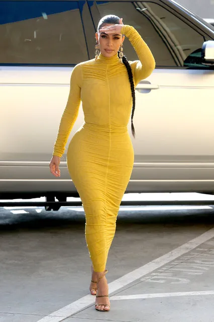 Kim Kardashian West looks stunning in a yellow bodycon dress as she arrives at a studio in Los Angeles, California on February 19, 2020. The reality star was filming “My Next Guest Needs No Introduction with David Letterman” in Glendale. Wearing the skin tight dress with statement earrings and a long plait, Kim arrived with momager Kris Jenner who looked smart in a black tuxedo-style suit. (Photo by Splash News and Pictures)