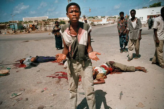 Somalia, Mogadishu.  Pakistani soldiers under UN mandate open fire on protestors  against the presence of foreign troops in July 1993. (Jean-Claude Coutausse)