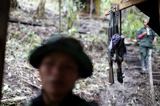 Weapons are seen at a camp of the 51st Front of the Revolutionary Armed Forces of Colombia (FARC) in Cordillera Oriental, Colombia, August 16, 2016. (Photo by John Vizcaino/Reuters)