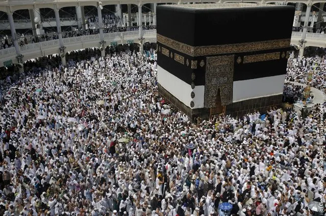 Muslim pilgrims pray around the holy Kaaba at the Grand Mosque ahead of the annual haj pilgrimage in Mecca September 21, 2015. (Photo by Ahmad Masood/Reuters)