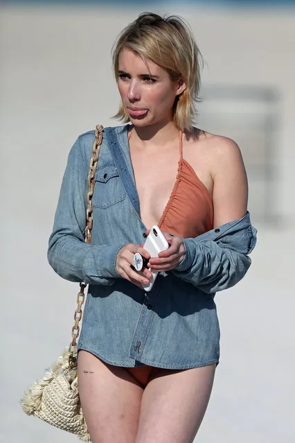 American actress and singer Emma Roberts gives a peek of her “hold me” tattoo on her thigh as she hits the beach in Miami. Miami, Florida – Wednesday December 13, 2017. (Photo by Thibault Monnier/LCD/PacificCoastNews)
