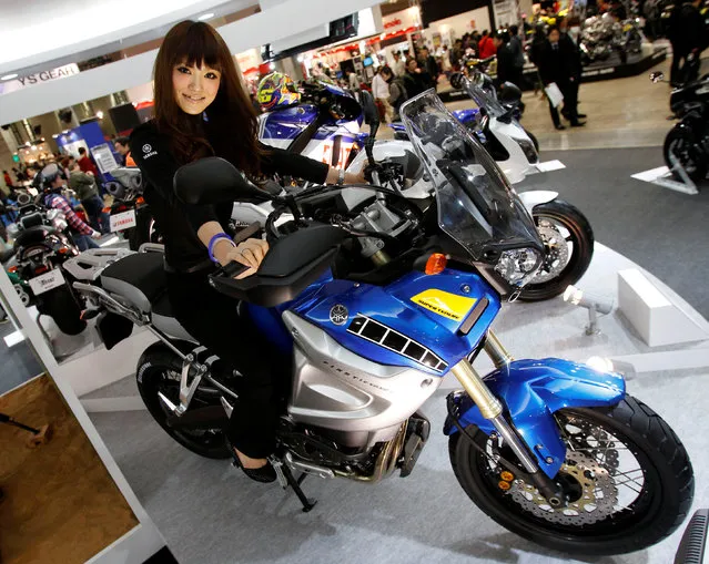 A model poses with the Yamaha Super Tenere at the 37th Tokyo Motorcycle Show March 26, 2010. (Photo by Toru Hanai/Reuters)