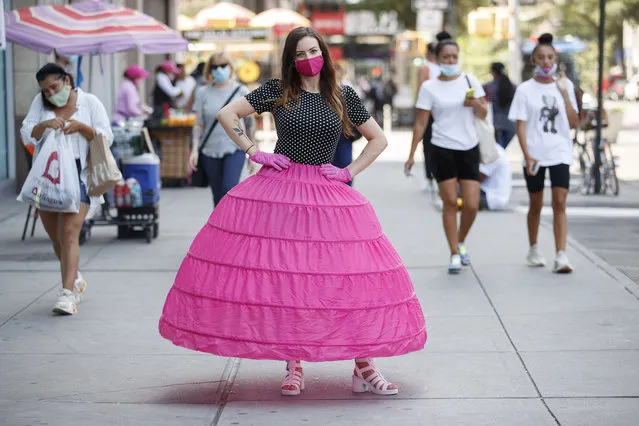Melkorka Licea wears a large hoop skirt around Manhattan in New York, NY. on August 11, 2020 to test out Coronavirus socially distant fashion. (Photo by Tamara Beckwith/The New York Post)