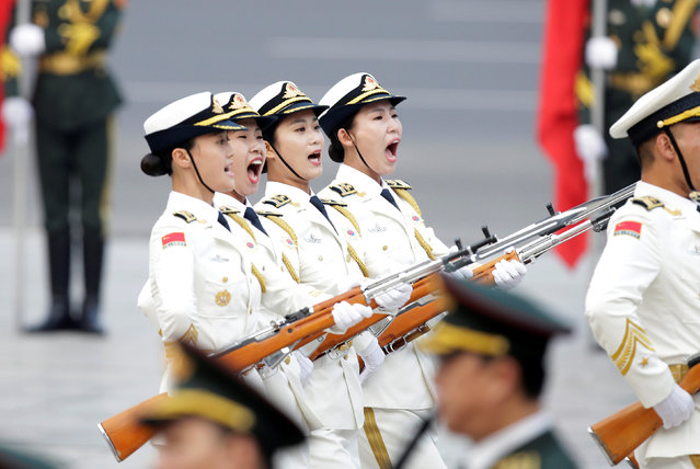 Female navy soldiers of honour guards attend a welcoming ceremony for Peru's President Pedro Pablo Kuczynski (not in picture) at the Great Hall of the People in Beijing, China, September 13, 2016. (Photo by Jason Lee/Reuters)