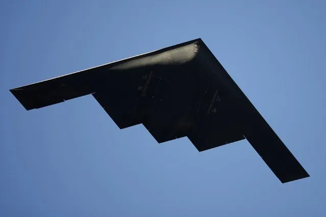 A B-2 Stealth Bomber performs a flyover at the 126th Rose Parade in Pasadena, California, in this file photo taken January 1, 2015. Northrop Grumman Corp, which makes the B-2 bomber, beat out a team made up of Boeing Co and Lockheed Martin Corp to develop and build a next-generation long-range strike bomber, the U.S. Defense Department said on Tuesday. (Photo by David McNew/Reuters)