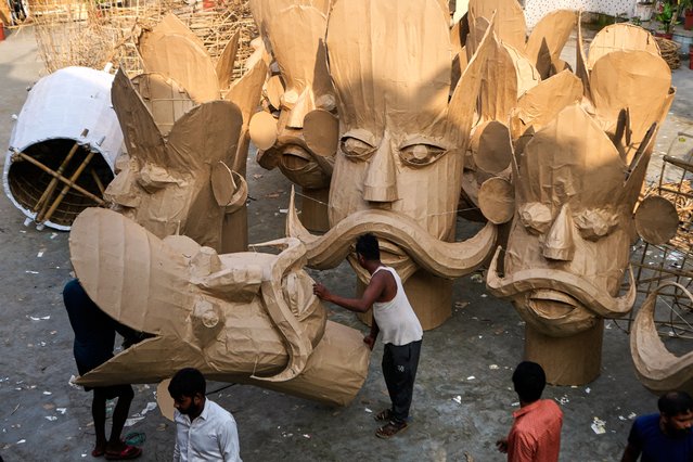 Indian artisans prepare effigies of antagonists in the Hindu epic Ramayana ahead of the Dussehra festival in Jammu, India, Wednesday, September 24, 2025. (Photo by Channi Anand/AP Photo)