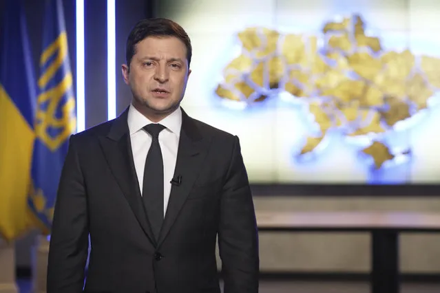 In this handout photo taken from video provided by the Ukrainian Presidential Press Office, Ukrainian President Volodymyr Zelenskyy addresses the nation in Kyiv, Ukraine, February 24, 2022. (Photo by Ukrainian Presidential Press Office via AP Photo)