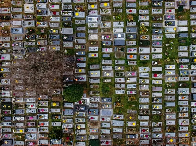 An aerial view of the closed historical Rakowicki Cemetery on November 01, 2020 in Krakow, Poland. Poland's Prime Minister, Mateusz Morawiecki, announced the closure of the cemeteries from October 31st to November 2nd as part of the latest restrictive measures to tackle the spread of the coronavirus. Poland today reported reported 17,171 new covid-19 cases and 152 deaths. (Photo by Omar Marques/Getty Images)