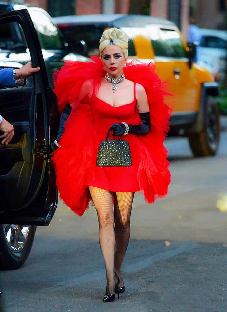 Lady Gaga looks striking in a 60's jazz inspired red outfit in NYC on May 24, 2018. (Photo by PapCulture/ Splash News and Pictures)