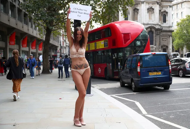 A woman protests against fur outside Sommerset House during London Fashion Week, in London, Britain, September 15, 2018. (Photo by Hannah McKay/Reuters)