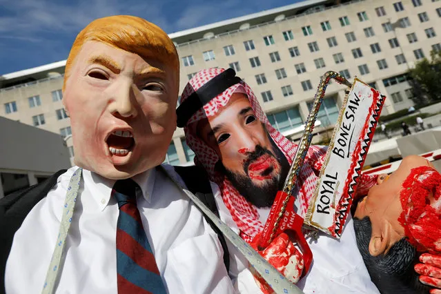 Activists from the group “code Pink” dressed as U.S. President Donald Trump and Saudi Crown Prince Mohammad bin Salman participate in a demonstration calling for sanctions against Saudi Arabia and against the disappearance of Saudi journalist Jamal Khashoggi in front of the U.S. State Department in Washington, U.S., October 19, 2018. (Photo by Kevin Lamarque/Reuters)