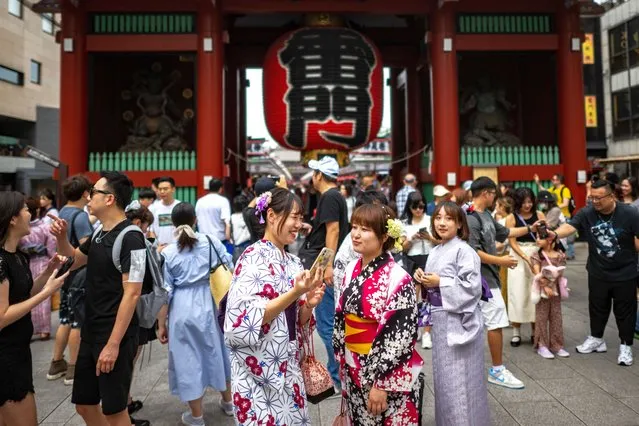 People visit Sensoji Temple, a popular tourist location, in Tokyo on September 7, 2023. (Photo by Philip Fong/AFP Photo)