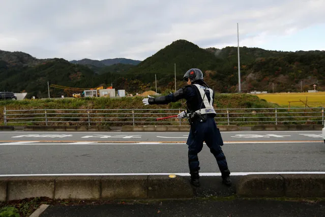 A police officer stands guard near a hot spring resort, the venue of the summit meeting between Japanese Prime Minister Shinzo Abe and Russian President Vladimir Putin, in Nagato, Yamaguchi prefecture, Japan, December 15, 2016. (Photo by Toru Hanai/Reuters)