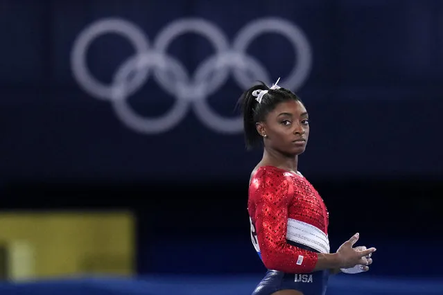 Simone Biles, of the United States, waits to perform on the vault during the artistic gymnastics women's final at the 2020 Summer Olympics, Tuesday, July 27, 2021, in Tokyo. The American gymnastics superstar has withdrawn the all-around competition to focus on her mental well-being. (Photo by Gregory Bull/AP Photo)