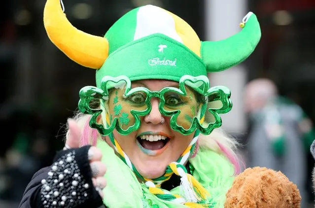 Participants gather for the annual St Patricks Day parade through the city centre of Dublin on March 17, 2019. (Photo by Paul Faith/AFP Photo)