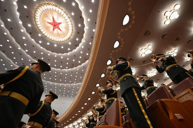 The People's Liberation Army (PLA) band performs ahead of the opening ceremony of the Chinese People's Political Consultative Conference (CPPCC) at the Great Hall of the People in Beijing on March 4, 2024. (Photo by Jade Gao/AFP Photo)