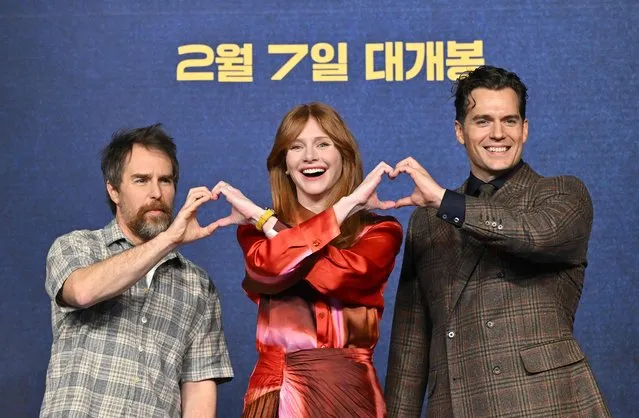 (From L to R) US actors Sam Rockwell and Bryce Dallas Howard pose with British actor Henry Cavill for photos during a press conference to promote their film “Argylle” in Seoul on January 18, 2024. (Photo by Jung Yeon-je/AFP Photo)