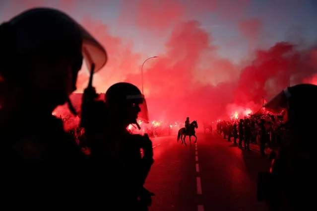 Police officers on horses outside the Metropolitano Stadium before the Uefa Champions League match between Atlético Madrid and FC Internazionale in Madrid, Spain on March 13, 2024. (Photo by Violeta Santos Moura/Reuters)
