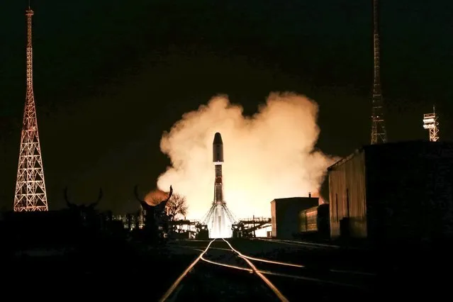 In this photo provided by the Roscosmos Space Agency Press Service, the Soyuz rocket blasts off from the launch pad at Russia's space facility in Baikonur, Kazakhstan, Wednesday, November 24, 2021. A Russian rocket blasted off successfully on Wednesday to deliver a new docking module to the International Space Station. The Soyuz rocket lifted off as scheduled at 6:06 p.m. (1306 GMT) from the Russian launch facility in Baikonur, Kazakhstan, carrying the Progress cargo ship with the Prichal (Pier) docking module attached to it. (Photo by Roscosmos Space Agency Press Service photo via AP Photo)