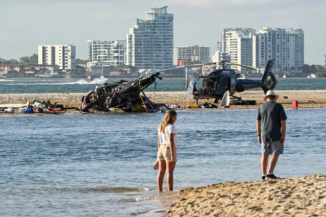 Two helicopters are seen following a collision near Seaworld, on the Gold Coast, Australia, 02 January 2023. Four people are dead and another 13 injured after two helicopters collided before one crashed into the Broadwater on the Gold Coast. (Photo by Dave Hunt/EPA/EFE/Rex Features/Shutterstock)