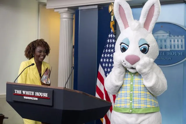 White House press secretary Karine Jean-Pierre arrives as the Easter Bunny stands at the podium before a briefing at the White House, Monday, April 1, 2024, in Washington. (Photo by Mark Schiefelbein/AP Photo)