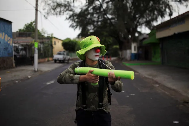 A demonstrator participates in the May Day march in San Salvador, El Salvador May 1, 2016. (Photo by Jose Cabezas/Reuters)