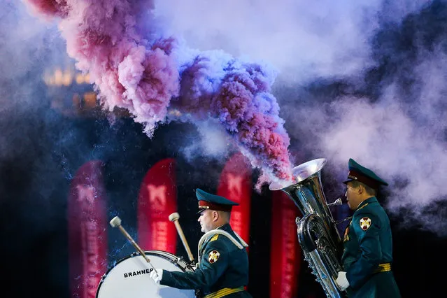 The Military Orchestra of the Russian National Guard's Siberian District perform during a final dress rehearsal for the 12th Spasskaya Tower International Military Music Festival in Red Square at night August 22, 2019 in Moscow, Russia. (Photo by Gavriil Grigorov/TASS)