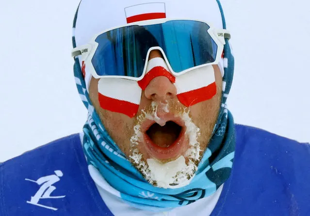 Poland's Dominik Bury reacts after competing in the men's 50km mass start free event, which was shortened to 30km due to high winds, on February 19, 2022 at the Zhangjiakou National Cross-Country Skiing Centre, during the Beijing 2022 Winter Olympic Games. (Photo by Kai Pfaffenbach/Reuters)