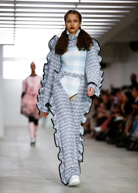 A model presents a creation during the Bobby Abley catwalk show at London Fashion Week in London, Britain, September 17, 2019. (Photo by Henry Nicholls/Reuters)