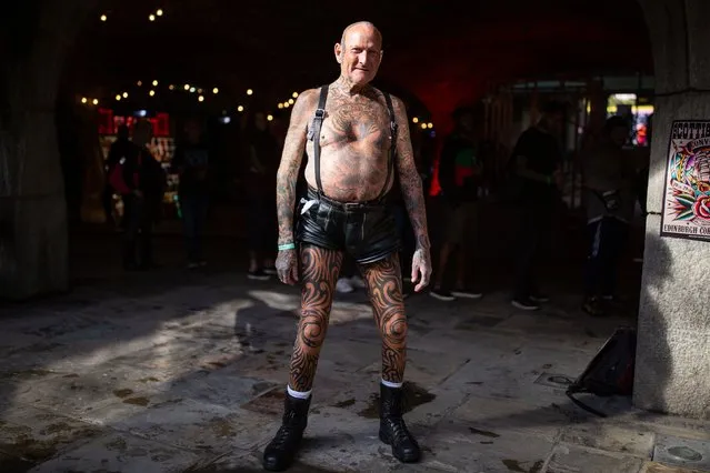 Colin Snow stands for a photo during the International tattoo convention at Tobacco Dock in east London, England on September 27, 2019. (Photo by Aaron Chown/PA Images via Getty Images)
