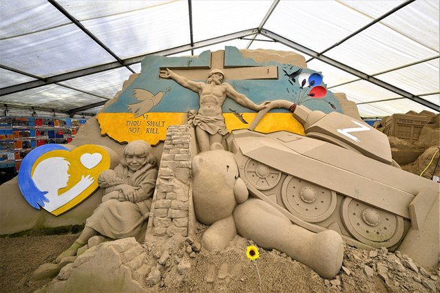 Preparing for the summer season opening this weekend, award-winning Ukrainian Sand Sculptor Slava Borecki's Ukrainian sand sculpture, sculpted at the beginning of the war in Ukraine, remains on display at Weymouth's SandWorld Sculpture Park, on April 06, 2023 in Weymouth, England. (Photo by Finnbarr Webster/Getty Images)