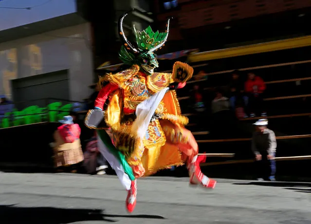 A dancer of the Diablada group performs during the “Senor del Gran Poder” (Lord of Great Power) parade in La Paz, May 21, 2016. (Photo by David Mercado/Reuters)