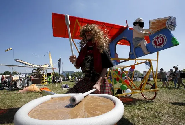 A participant prepares before the Red Bull Flugtag Russia 2015 competition in Moscow, Russia, July 26, 2015. (Photo by Sergei Karpukhin/Reuters)