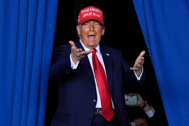 Republican presidential nominee former President Donald Trump arrives to speak during a campaign rally at Dodge County Airport, Sunday, October 6, 2024, in Juneau, Wis. (Photo by Julia Demaree Nikhinson/AP Photo)