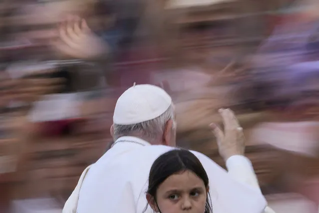Pope Francis arrives in St. Peter's Square at the Vatican for the participants into the World Meeting of Families in Rome, Saturday, June 25, 2022. The World Meeting of Families was created by Pope John Paul II in 1994 and celebrated every three years since then in different cities. (Photo by Andrew Medichini/AP Photo)