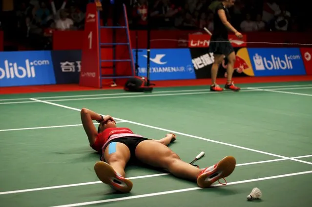 Spain's Carolina Marin reacts after winning India's Saina Nehwal after their women's finals badminton match at the BWF World Championships in Jakarta, Indonesia August 16, 2015. (Photo by Darren Whiteside/Reuters)