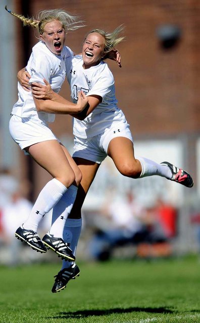 Honorable Mention, Sports Feature. Photo by Matt Gade of the Deseret News: Ashley Christensen, left, celebrates her goal with teammate Rachelle Powley during a game in Alta, Utah. (Photo by Matt Gade)
