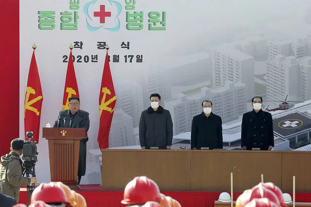 In this Tuesday, March 17, 2020, photo provided on Wendesday, March 18, 2020, by the North Korean government, North Korean leader Kim Jong Un, left, delivers a speech during the ground-breaking ceremony of a general hospital in Pyongyang, North Korea. Kim said it’s “crucial” to improve his country’s health care system during the ceremony, state media reported Wednesday, amid worries about a coronavirus outbreak in the impoverished North. Independent journalists were not given access to cover the event depicted in this image distributed by the North Korean government. The content of this image is as provided and cannot be independently verified. (Photo by Korean Central News Agency/Korea News Service via AP Photo)