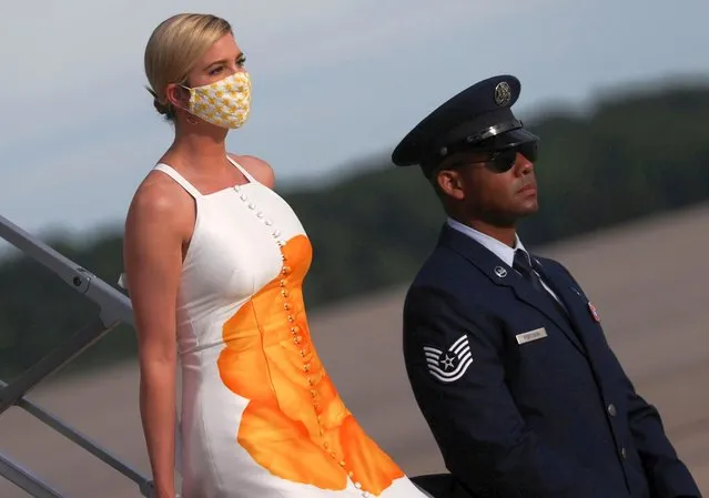 Ivanka Trump wears a protective face mask as she deplanes from Air Force One returning to Washington with her father U.S. President Donald Trump, after traveling to the Kennedy Space Center in Florida during the coronavirus disease (COVID-19) pandemic, at Joint Base Andrews, Maryland, U.S. May 27, 2020. (Photo by Jonathan Ernst/Reuters)