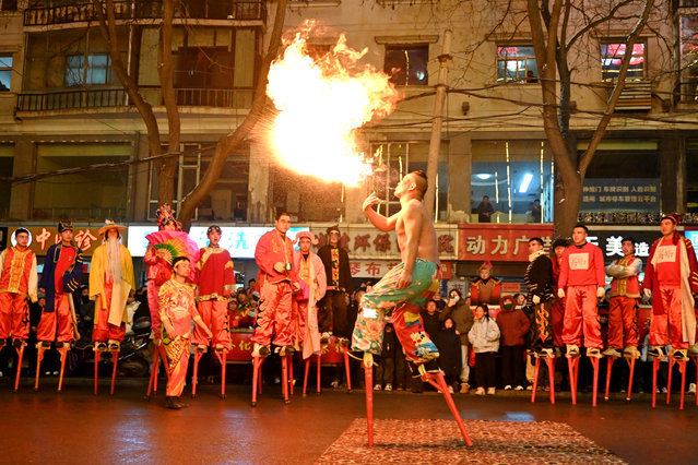People participate in an art parade to mark lantern festival in Luliang, northern China's Shanxi province on February 11, 2025. (Photo by Adek Berry/AFP Photo)