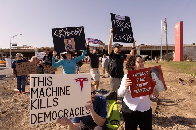 Protesters demonstrate in an emerging grassroots movement to protest Elon Musk's role in sweeping cuts to the federal workforce at the behest of President Donald Trump, at a Tesla showroom in Austin, Texas on March 15, 2025. (Photo by Nuri Vallbona/Reuters)