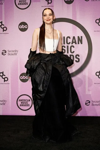 American singer Dove Cameron winner of the New Artist of the Year award poses in the press room during the 2022 American Music Awards at Microsoft Theater on November 20, 2022 in Los Angeles, California. (Photo by Frazer Harrison/Getty Images/AFP Photo)