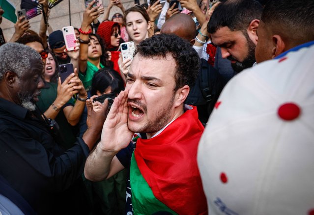 Former Columbia University student and pro-Palestinian protest leader Mahmoud Khalil shouts slogans in front of Columbia University after delivering a press conference in New York City on June 22, 2025, two days after his release from US custody. Khalil, one of the most prominent leaders of US pro-Palestinian campus protests, pledged on June 21 to keep campaigning after he was released from a federal detention center. Khalil, a legal permanent resident in the United States who is married to a US citizen and has a US-born son, had been in custody since March facing potential deportation. (Photo by Kena Betancur/AFP Photo)