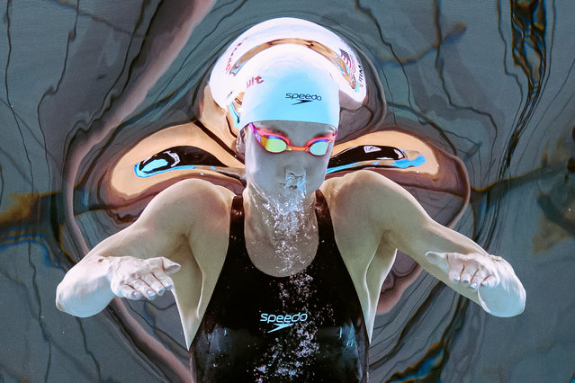An underwater view shows US' swimmer Regan Smith as she competes in a heat of the women's 200m butterfly swimming event during the 2025 World Aquatics Championships in Singapore on July 30, 2025. (Photo by François-Xavier Marit/AFP Photo)